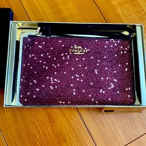 Coach wristlet in raspberry heart glitter
